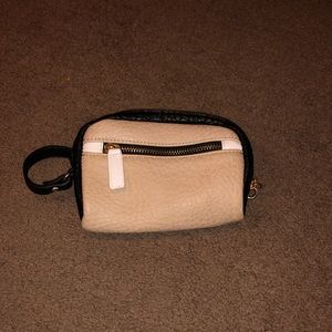 Beige and black wristlet